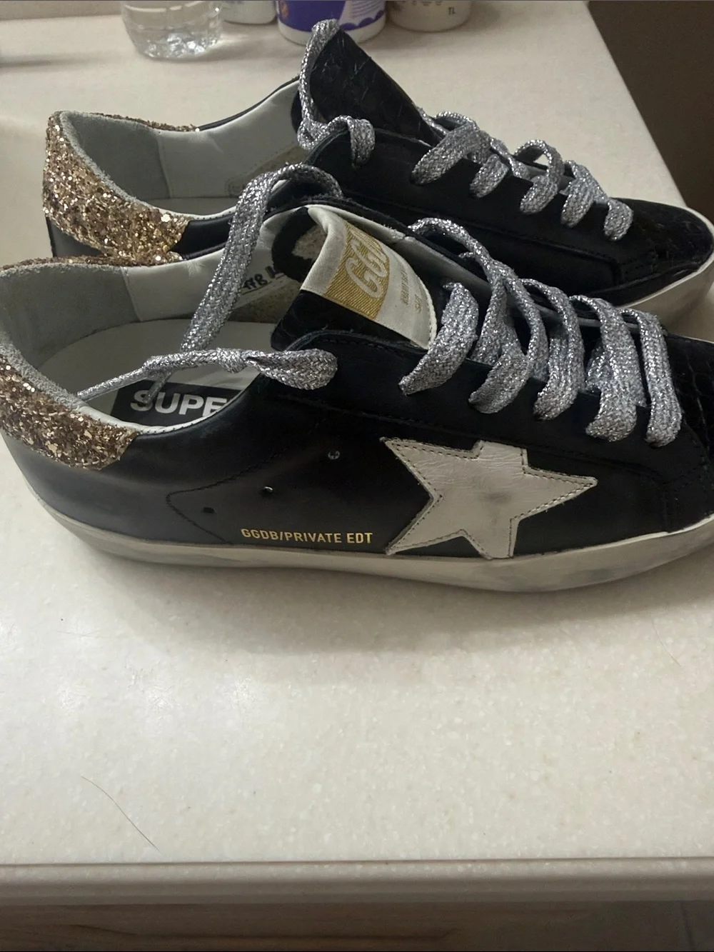 Golden Goose Black Sneakers with Silver Laces and Gold Heel Trim